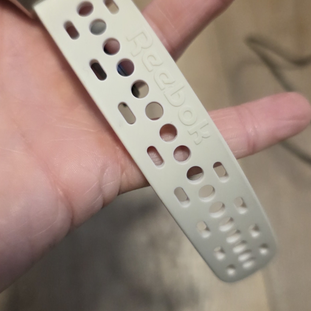Reebok ($150) Fitness Smartwatch Beige Perforated Sport Band - Picture 3 of 6
